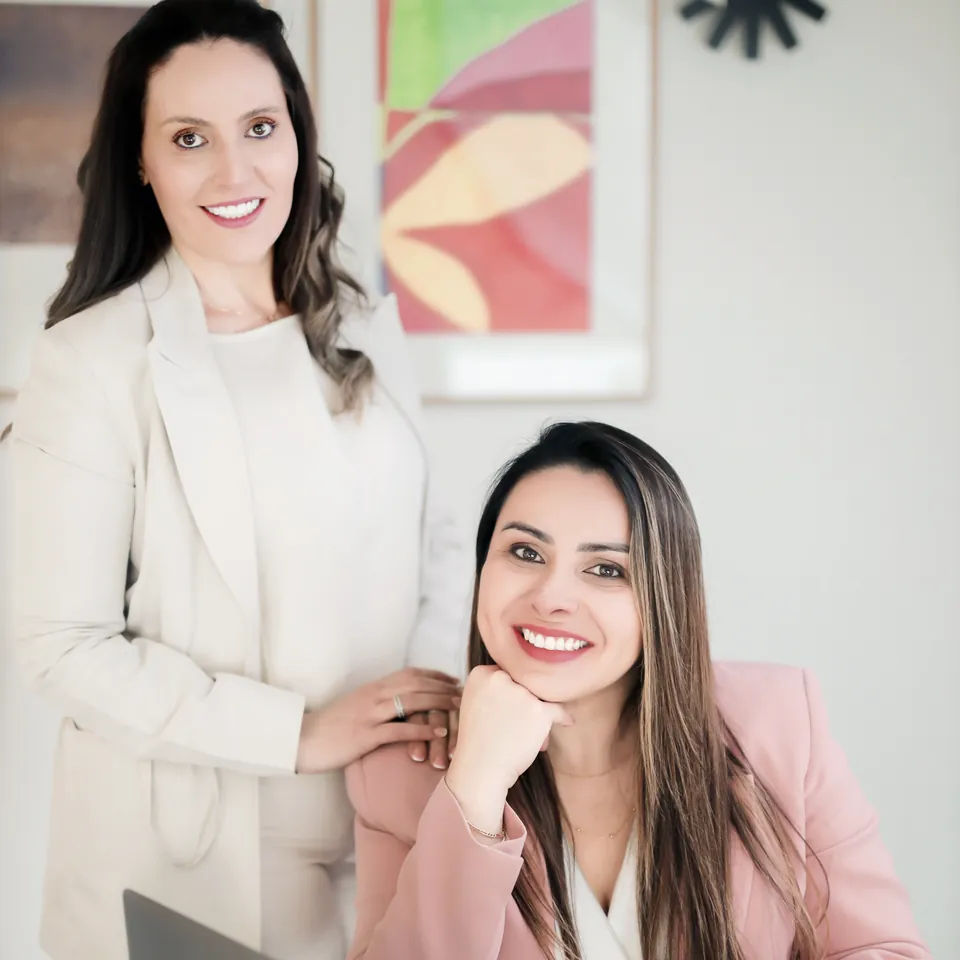The founders of ThriveUp Career reviewing a career strategy together