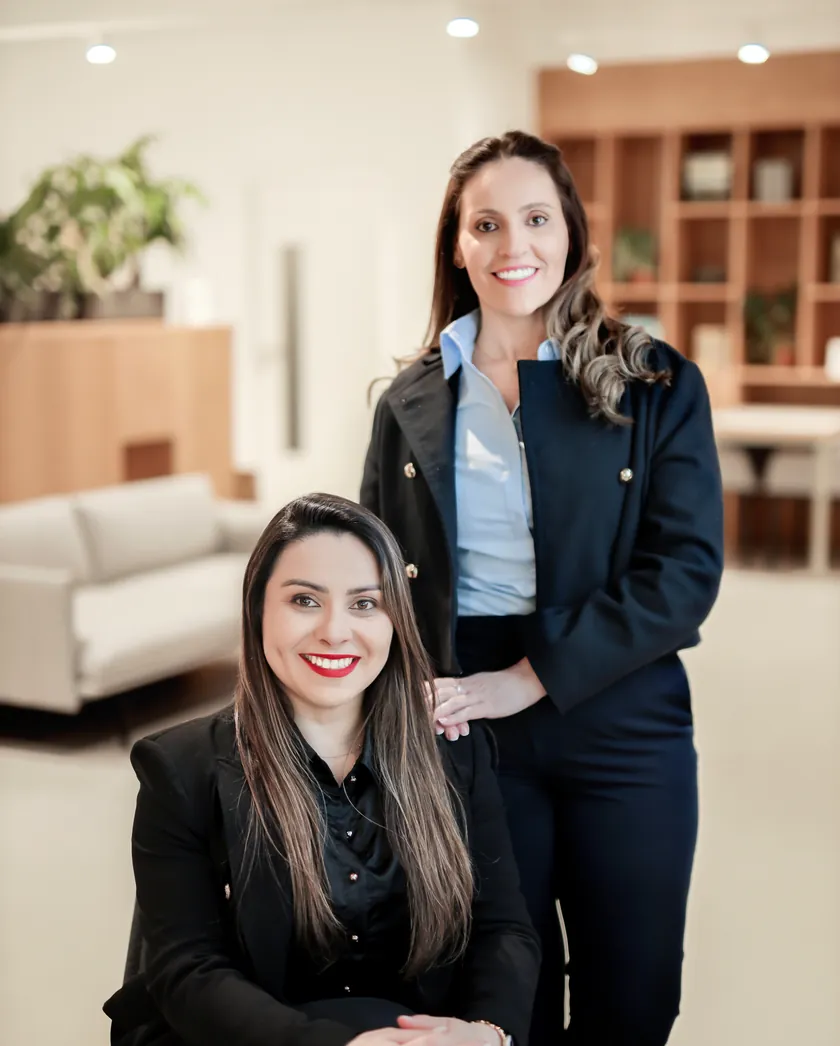 The founders of ThriveUp Career in their office